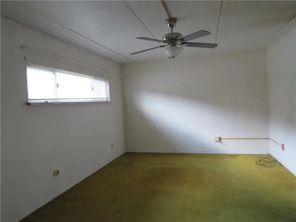 en empty room with a window