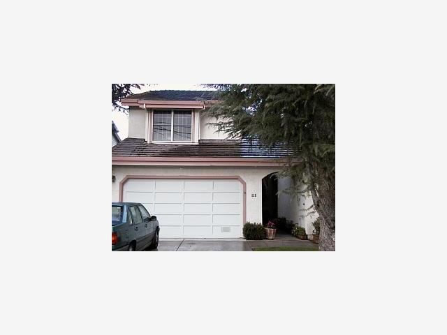 139 Redding Road Campbell, CA 95008 - Photo 1 of 1 a living room with a couch and a fireplace