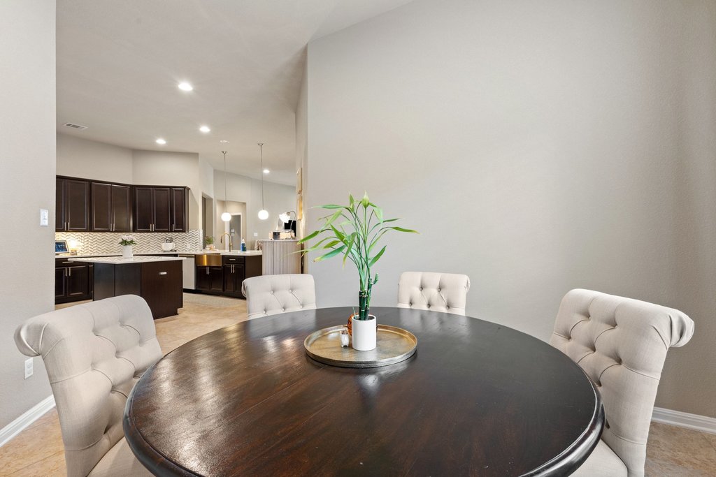 13808 Field Stream Lane Manor, TX 78653 - Photo 16 of 39 Dining space featuring baseboards and recessed lighting