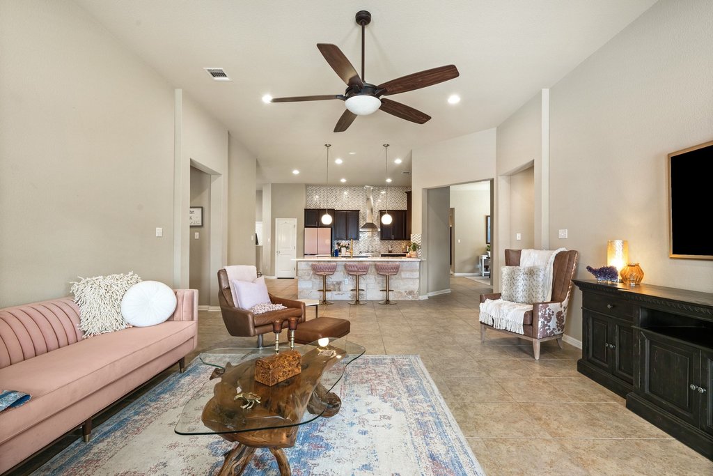 13808 Field Stream Lane Manor, TX 78653 - Photo 19 of 39 Living room featuring a ceiling fan, light tile patterned floors, and recessed lighting