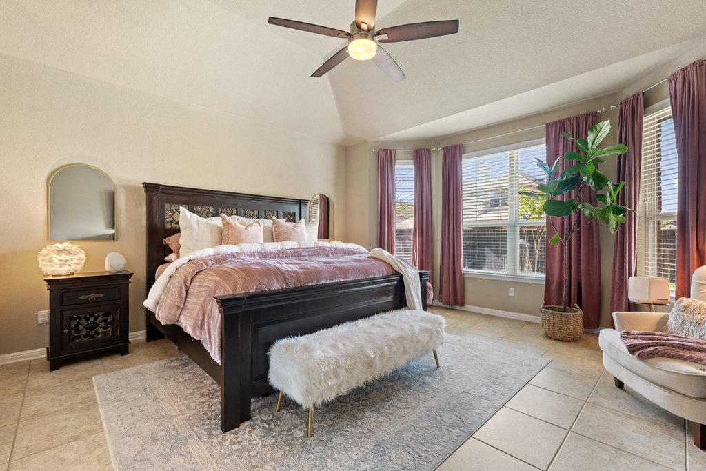 13808 Field Stream Lane Manor, TX 78653 - Photo 4 of 39 Bedroom featuring vaulted ceiling, ceiling fan, and light tile patterned floors