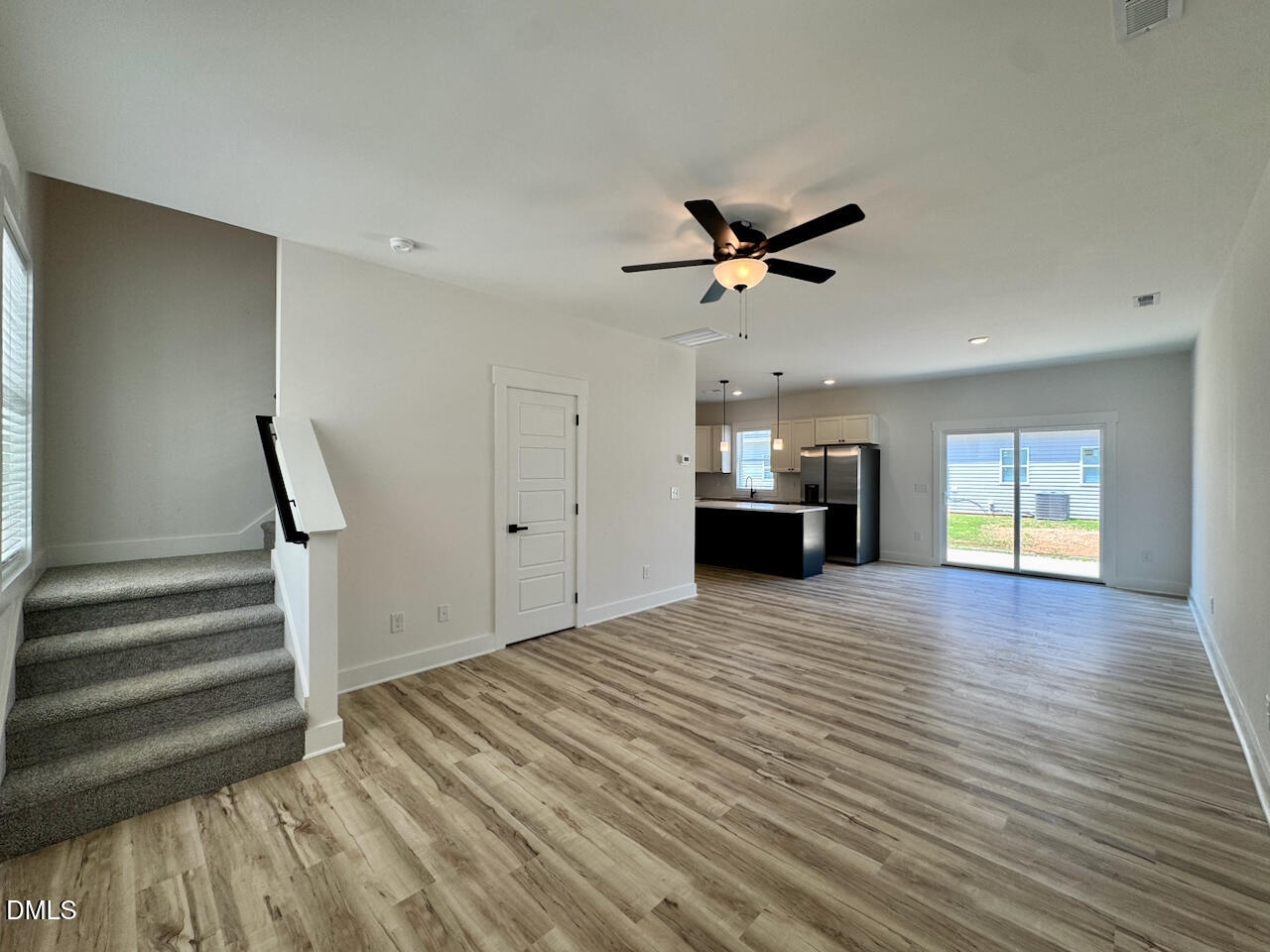 218 George Street Four Oaks, NC 27524 - Photo 6 of 33 Living Room Width + Natural Light