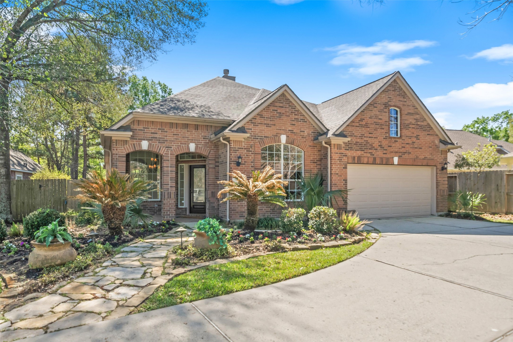 7 Sovereign Way Conroe, TX 77384 - Photo 31 of 31 a front view of a house with a yard