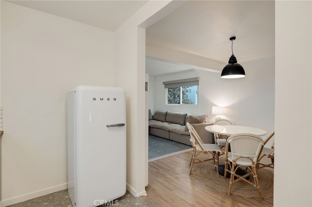 1706 Carver Street Redondo Beach, CA 90278 - Photo 17 of 40 a living room with furniture and a chandelier