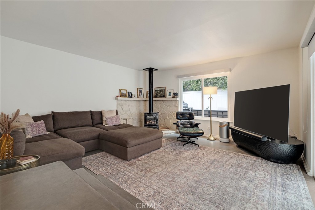 1706 Carver Street Redondo Beach, CA 90278 - Photo 18 of 40 a living room with furniture and a flat screen tv