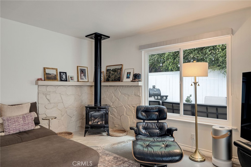 1706 Carver Street Redondo Beach, CA 90278 - Photo 20 of 40 a living room with furniture a rug and a large window