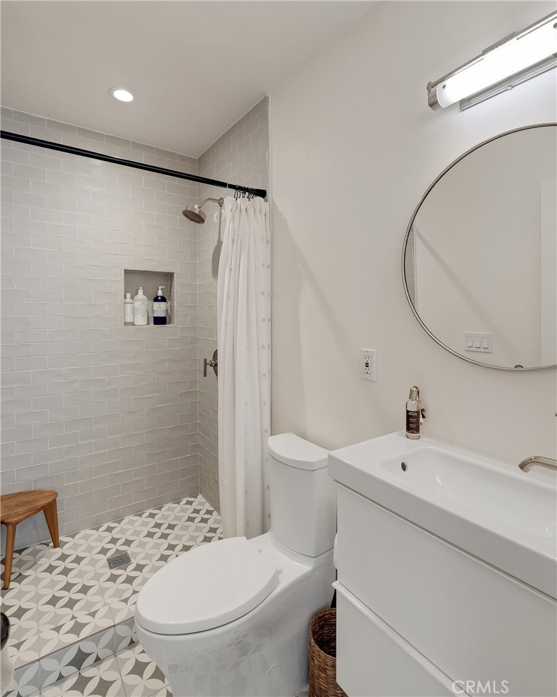1706 Carver Street Redondo Beach, CA 90278 - Photo 25 of 40 a bathroom with a sink a toilet and shower