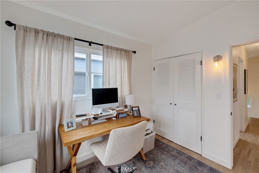 1706 Carver Street Redondo Beach, CA 90278 - Photo 28 of 40 a view of a workspace with furniture and a window