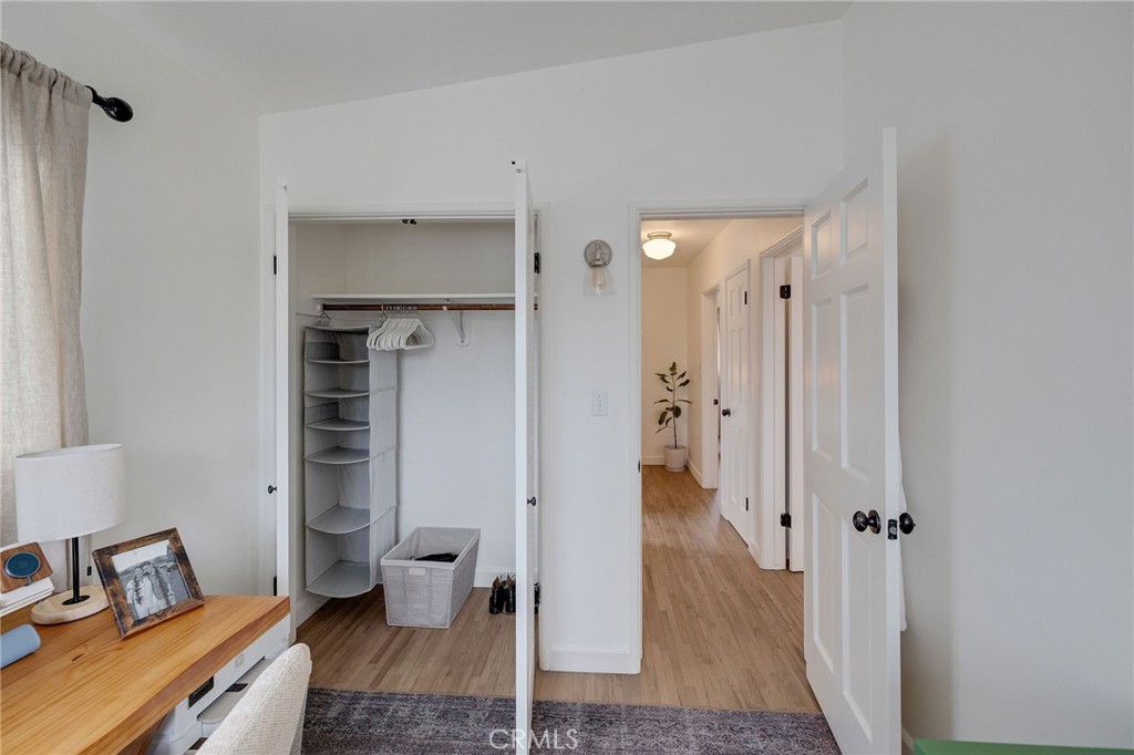 1706 Carver Street Redondo Beach, CA 90278 - Photo 29 of 40 a view of a room with wooden floor and a bathroom