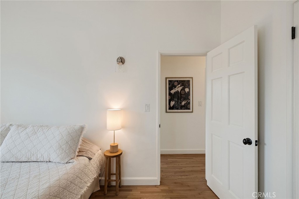 1706 Carver Street Redondo Beach, CA 90278 - Photo 32 of 40 a bed room with a bed and a night stand