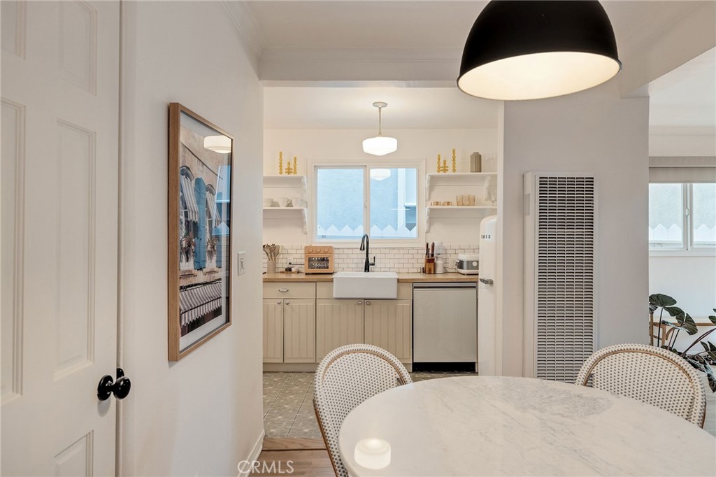 1706 Carver Street Redondo Beach, CA 90278 - Photo 10 of 40 a kitchen with stainless steel appliances granite countertop a refrigerator and a stove top oven