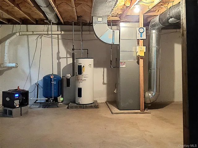 a backyard of a house with plants and large trees