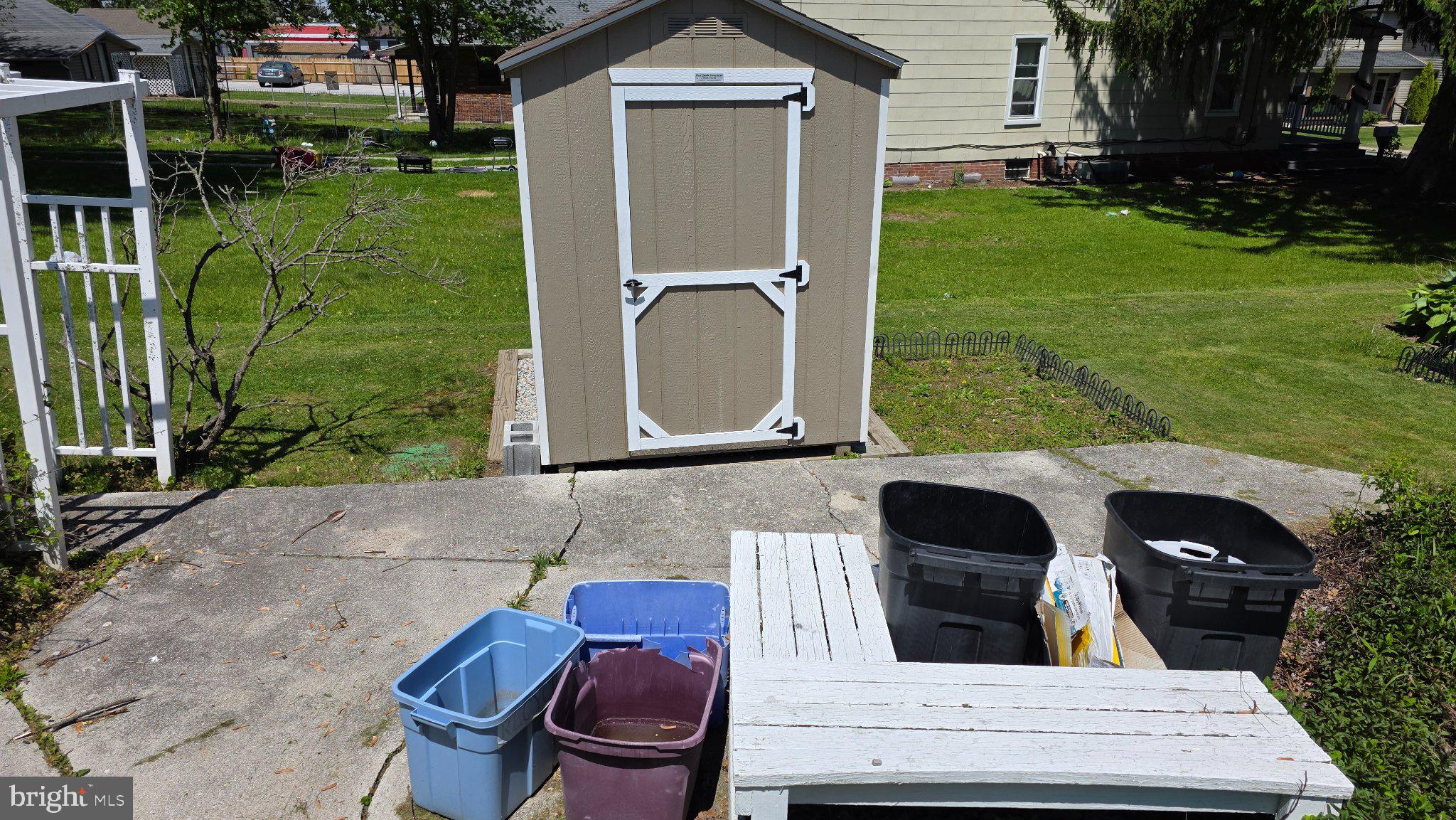 917 Baltimore Street Hanover, PA 17331 - Photo 3 of 19 Garden shed amidst a tidy yard.
