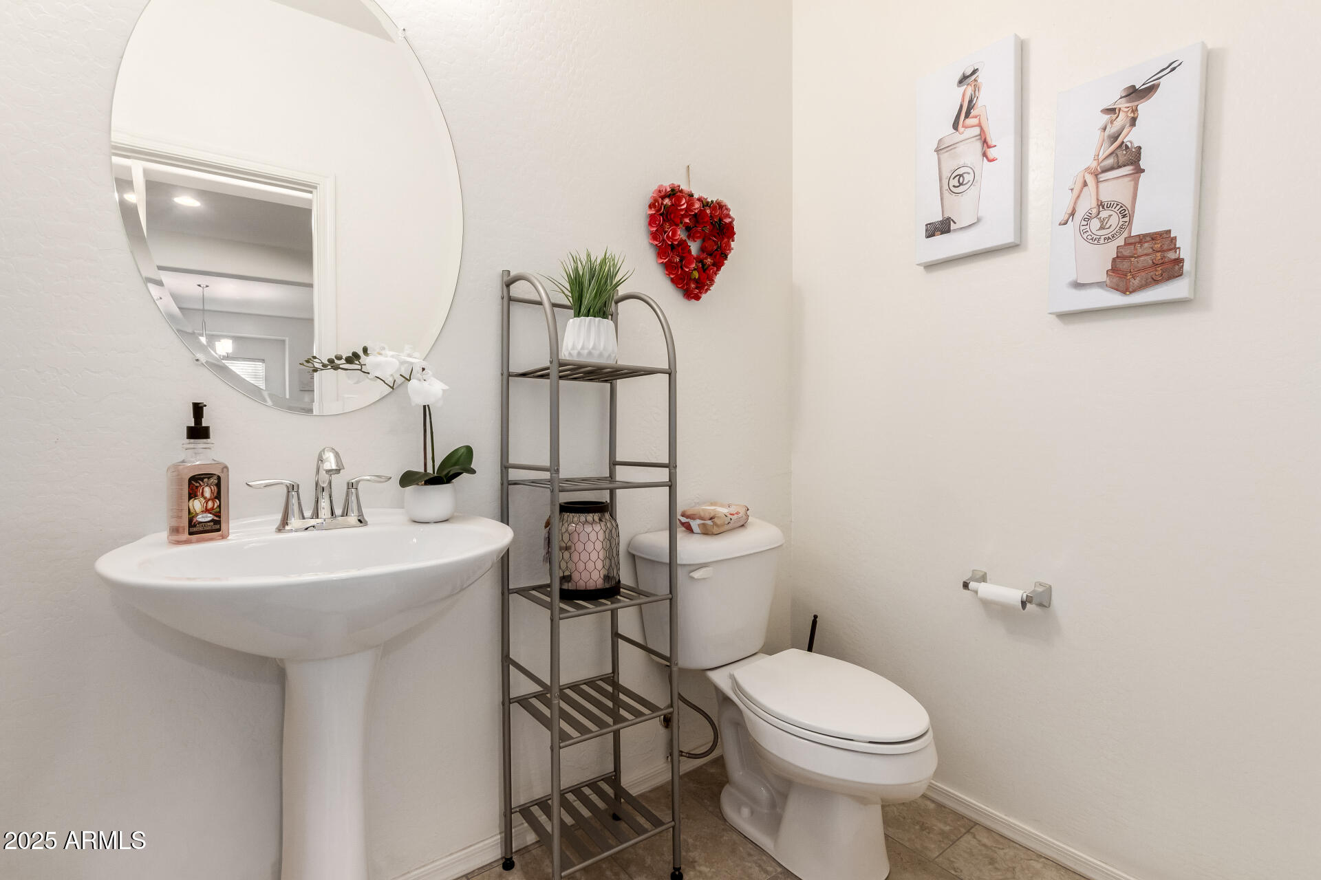 2665 East Gillcrest Road Gilbert, AZ 85298 - Photo 17 of 48 a bathroom with a sink mirror and toilet