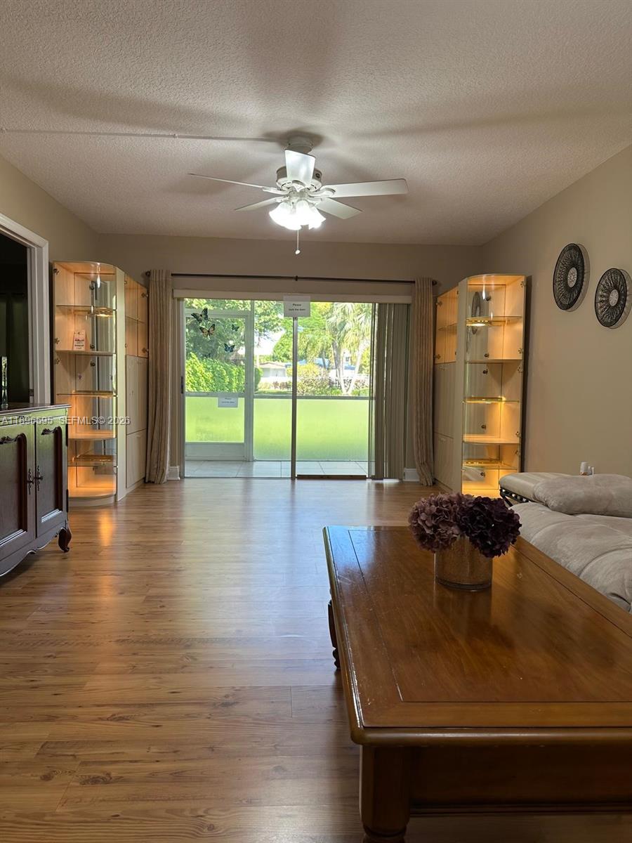 9848 Marina Boulevard, Unit 811 Boca Raton, FL 33428 - Photo 23 of 86 a view of a dining room with furniture window and wooden floor