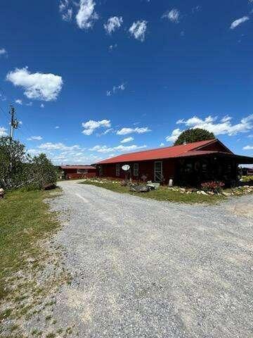 1140 Old Collard Valley Road Aragon, GA 30104 - Photo 1 of 1 a view of a yard with an umbrella and a fire pit