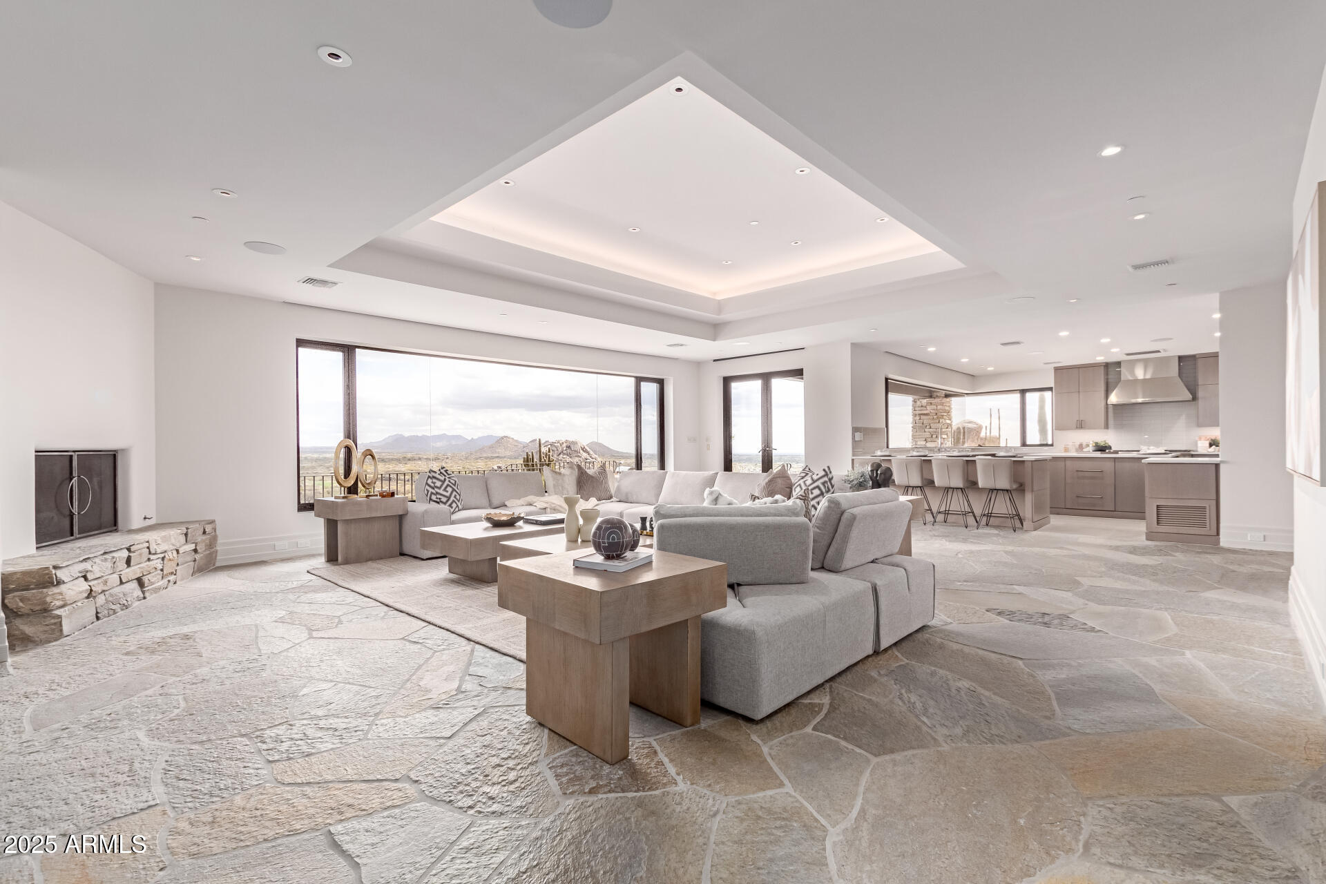 6901 East Restin Road Carefree, AZ 85377 - Photo 12 of 59 a living room with furniture and a large window