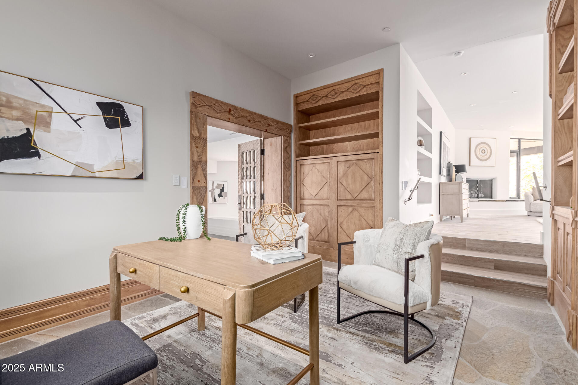 6901 East Restin Road Carefree, AZ 85377 - Photo 22 of 59 a view of a livingroom with furniture and a table