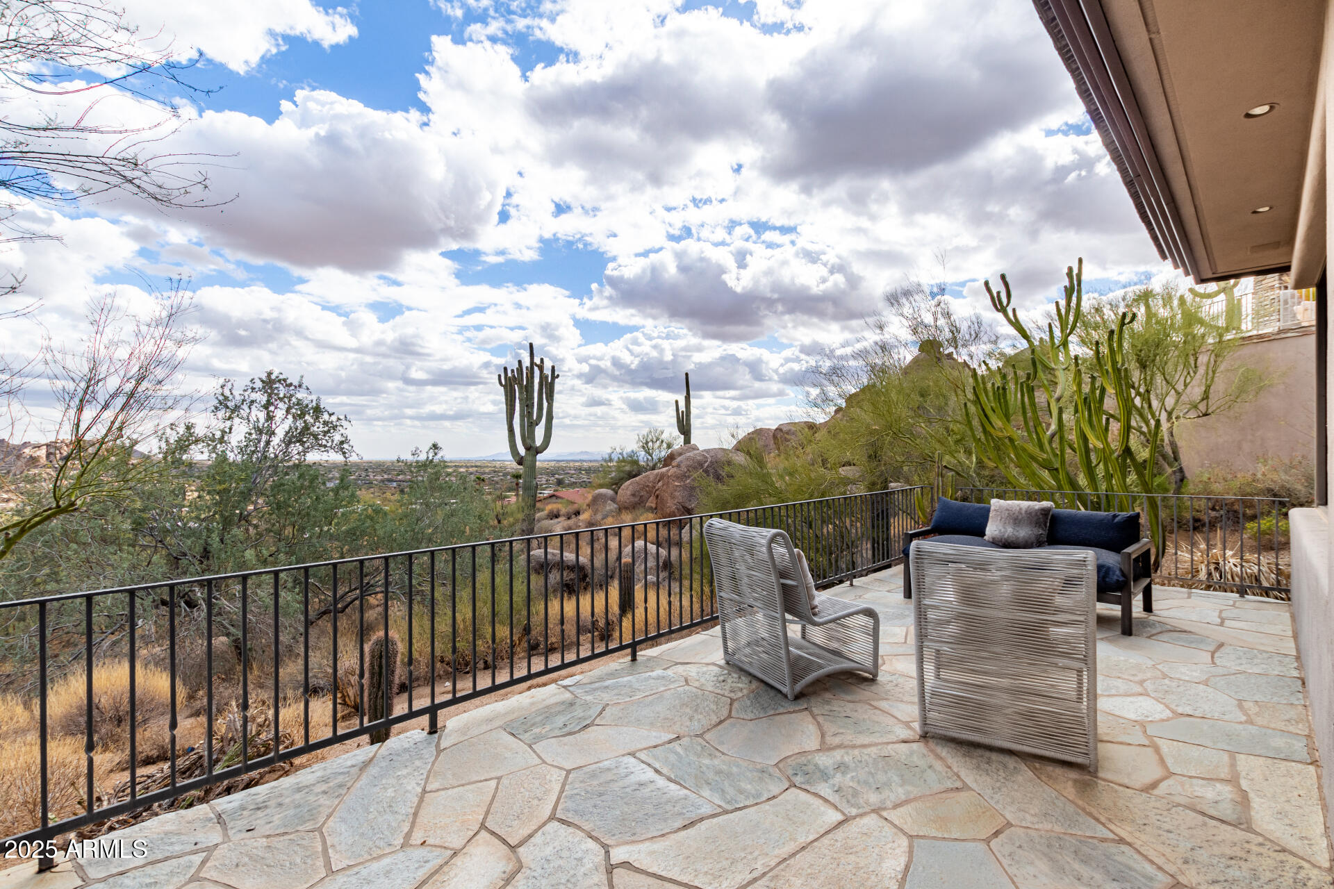 6901 East Restin Road Carefree, AZ 85377 - Photo 40 of 59 a view of a terrace with furniture