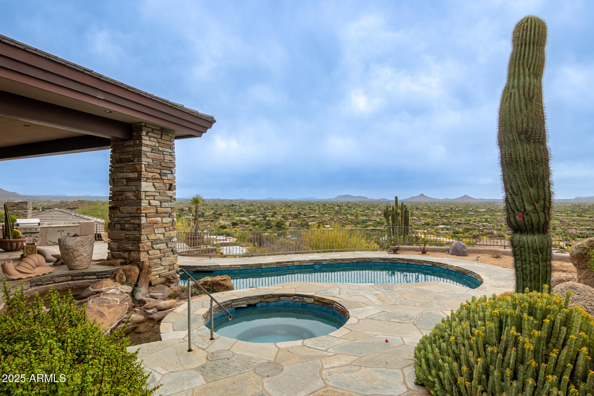 6901 East Restin Road Carefree, AZ 85377 - Photo 52 of 59 a view of a swimming pool and outdoor space
