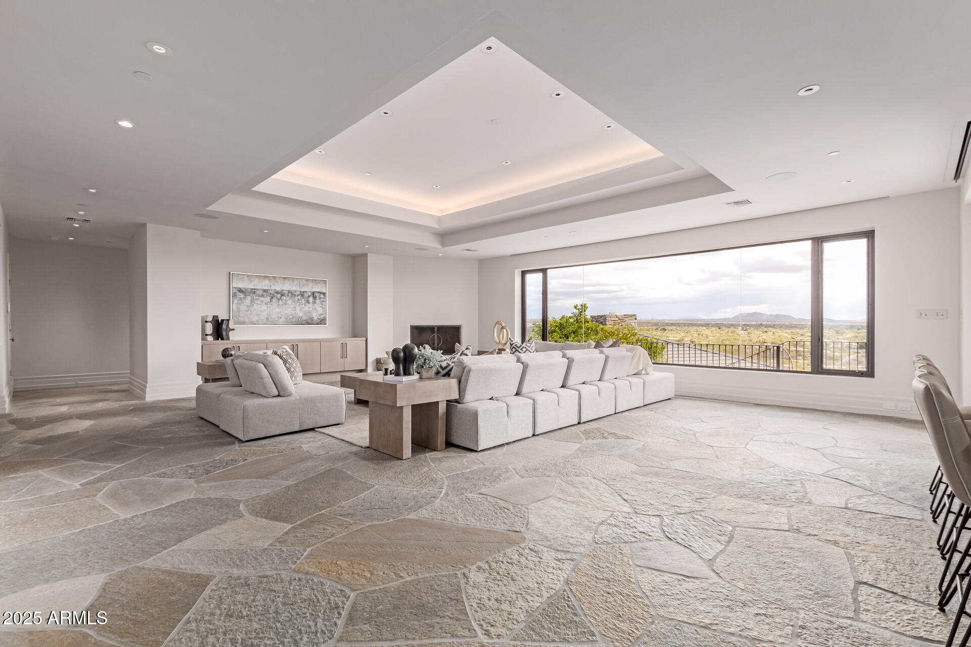 6901 East Restin Road Carefree, AZ 85377 - Photo 8 of 59 a living room with furniture and a large window