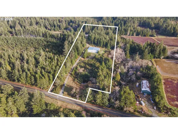 a black and white photo of a house