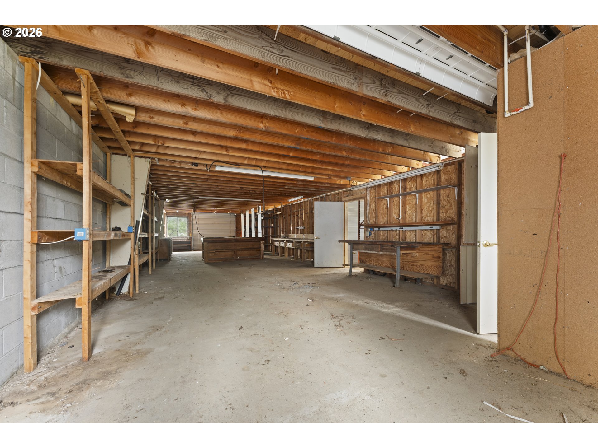 53665 Rosa Road Bandon, OR 97411 - Photo 12 of 47 a view of empty room with wooden ceiling