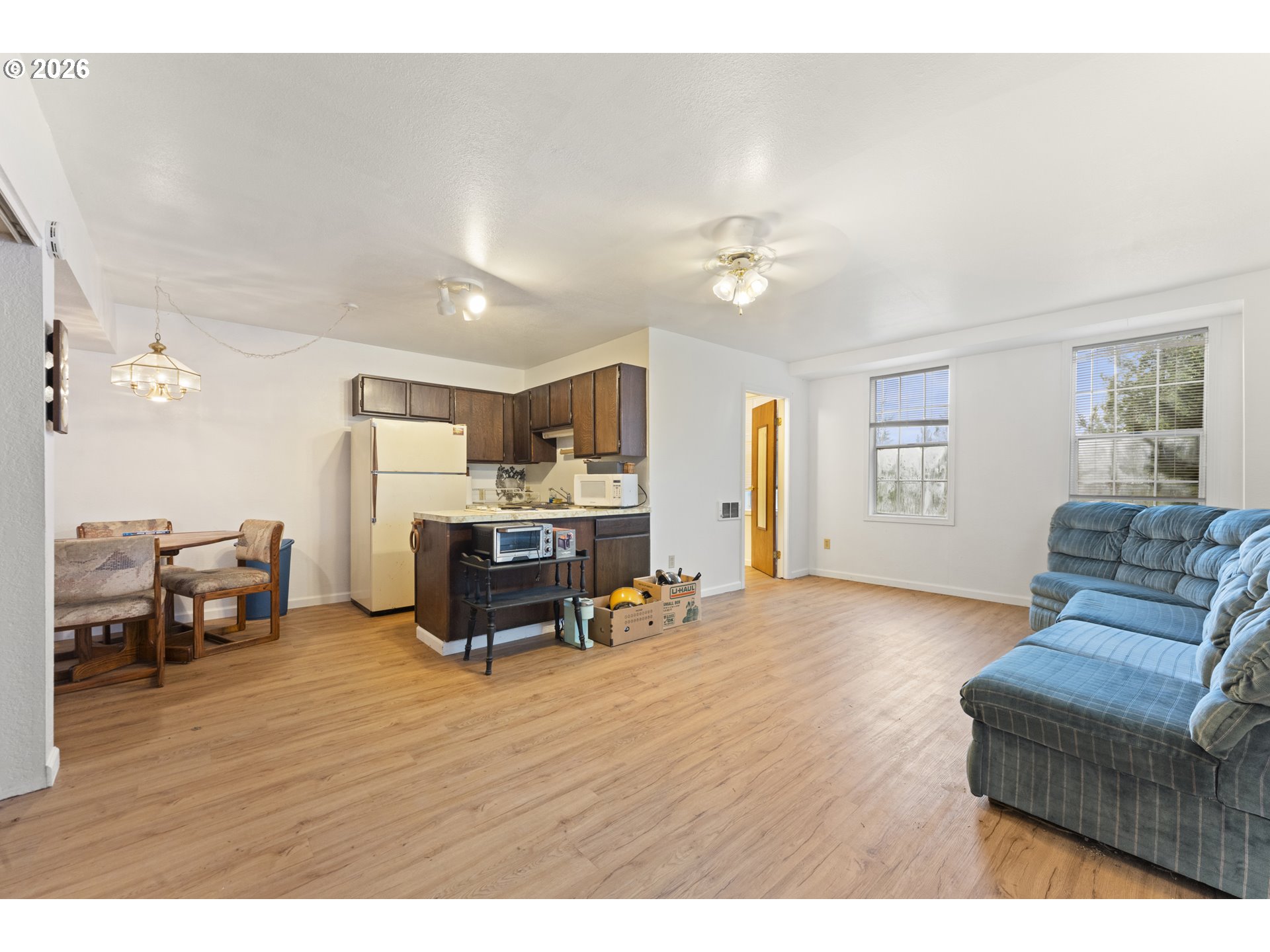 53665 Rosa Road Bandon, OR 97411 - Photo 15 of 47 a living room with furniture and kitchen view