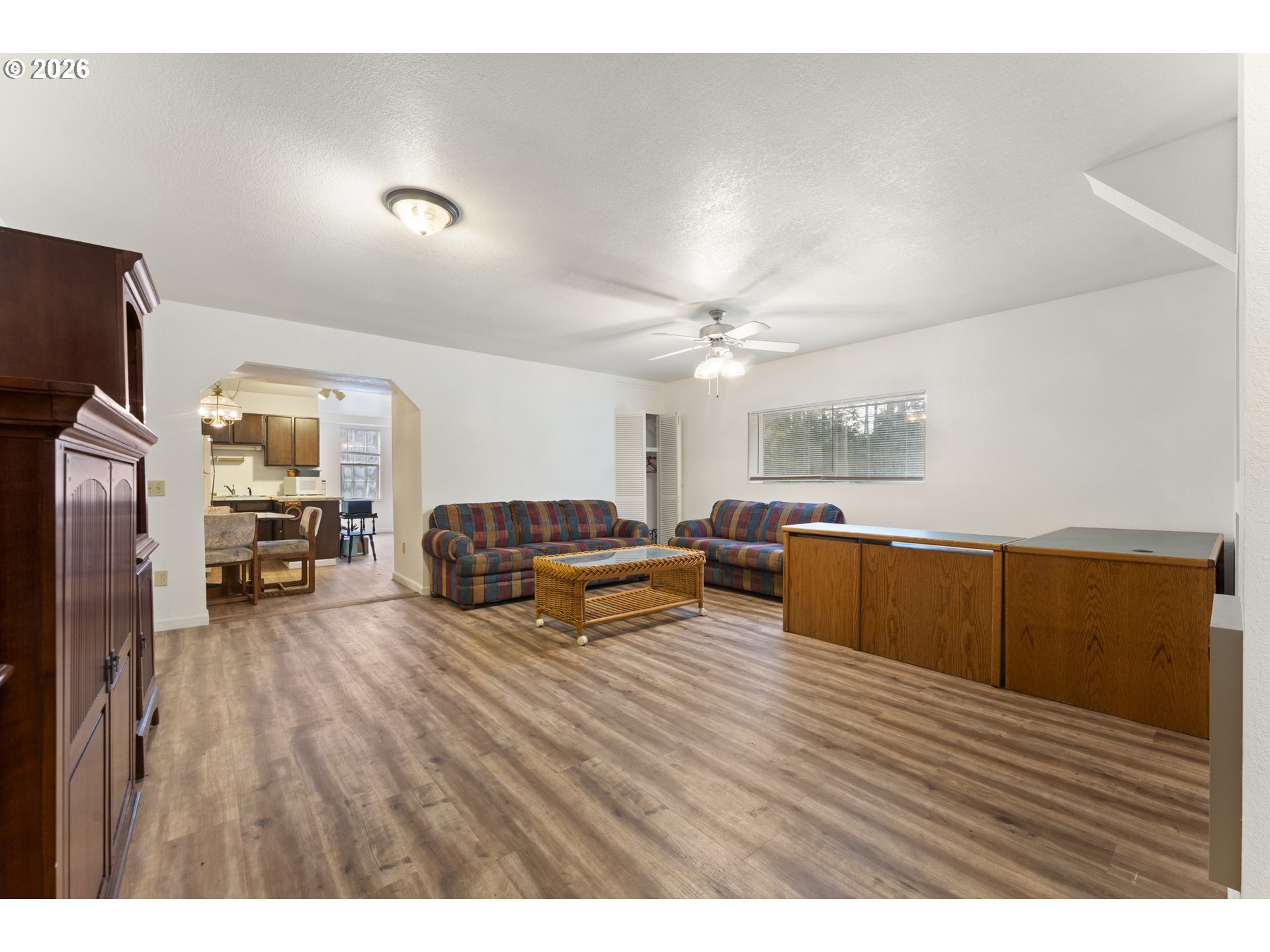 53665 Rosa Road Bandon, OR 97411 - Photo 20 of 47 a living room with furniture and a flat screen tv
