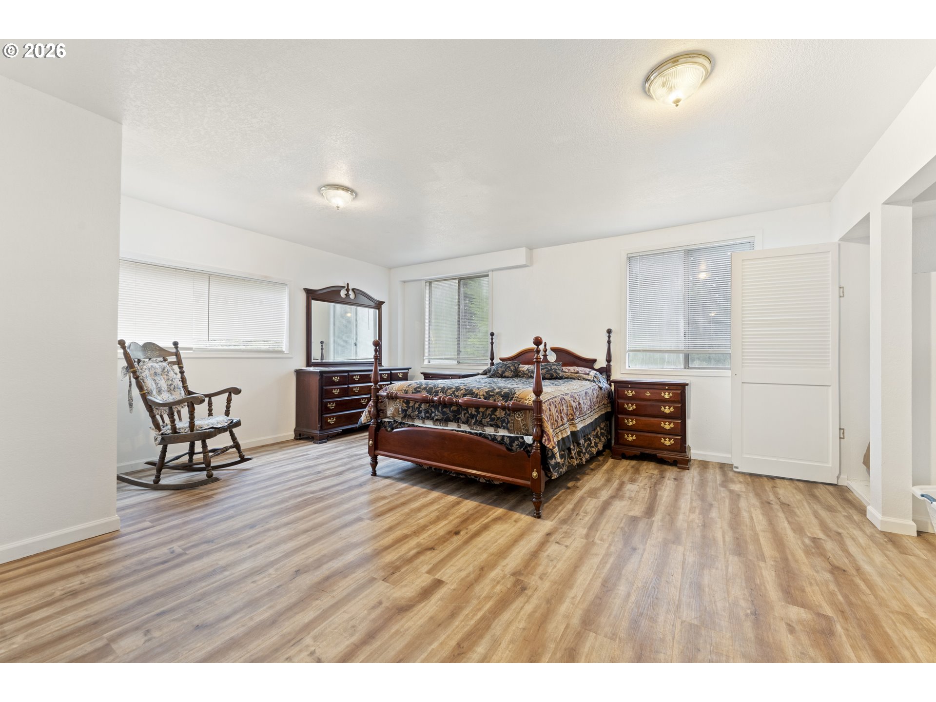 53665 Rosa Road Bandon, OR 97411 - Photo 24 of 47 a living room with furniture and a wooden floor