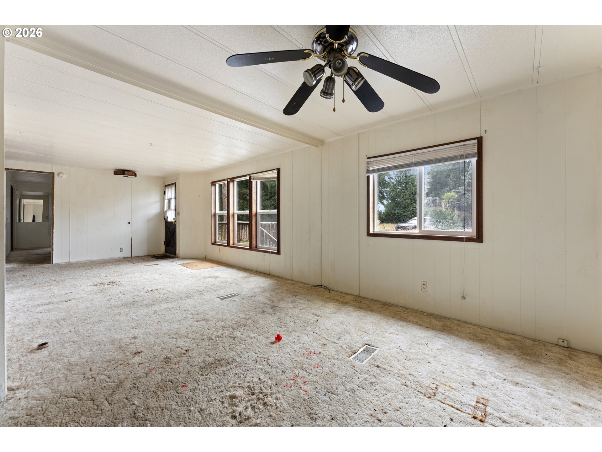 53665 Rosa Road Bandon, OR 97411 - Photo 30 of 47 a view of an empty room with a window