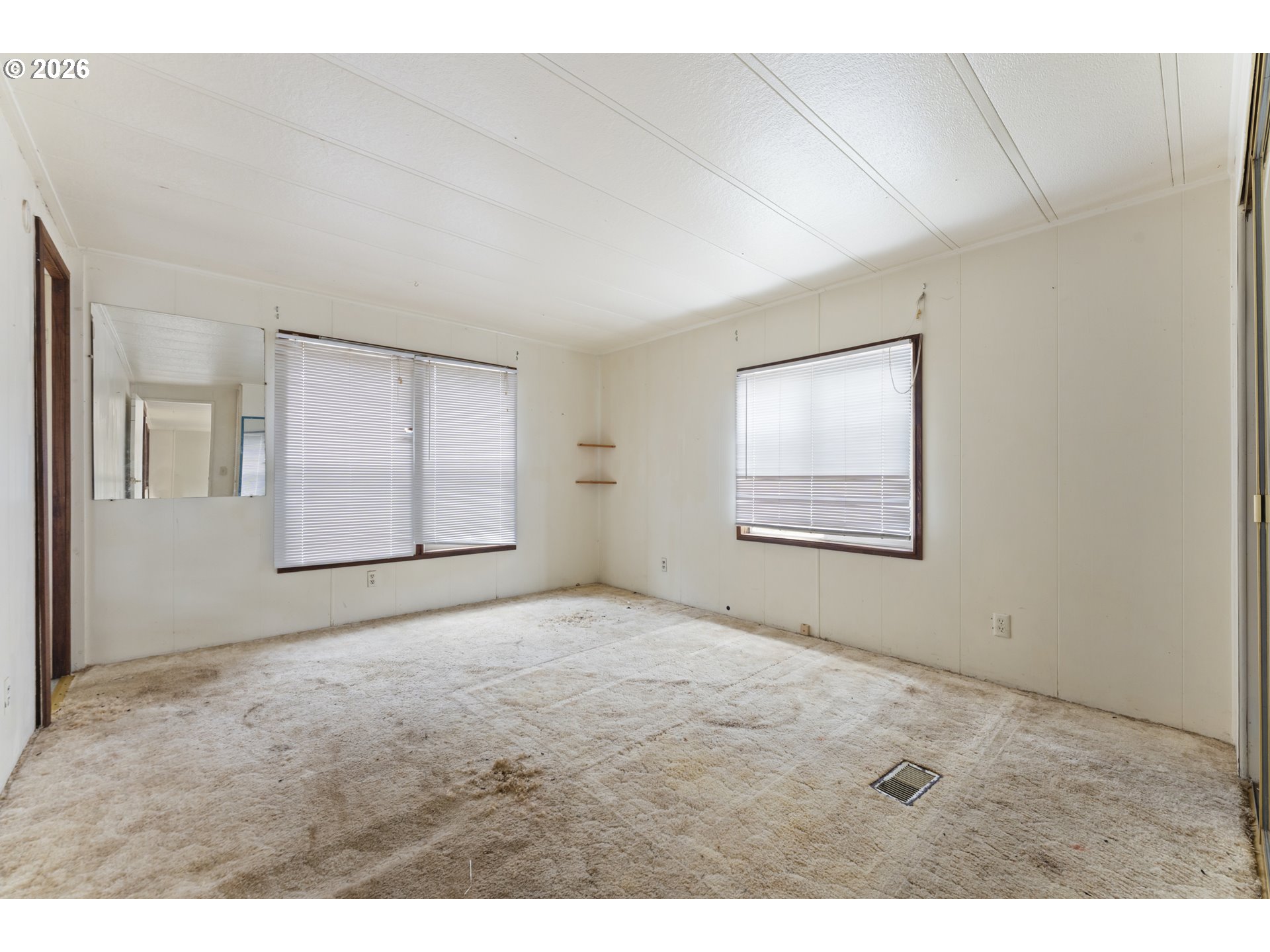 53665 Rosa Road Bandon, OR 97411 - Photo 32 of 47 a view of an empty room with a window