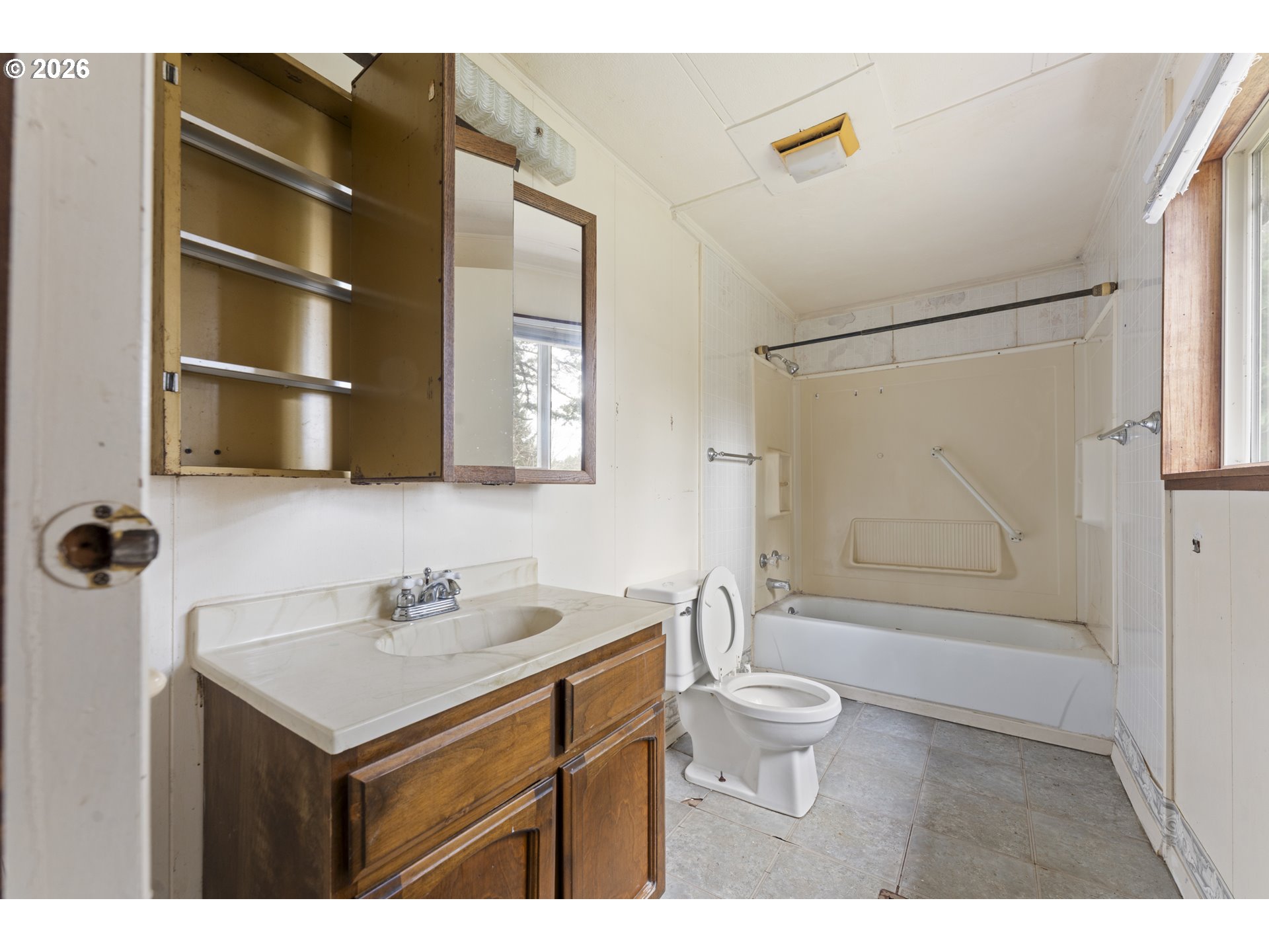 53665 Rosa Road Bandon, OR 97411 - Photo 33 of 47 a bathroom with a sink toilet and shower