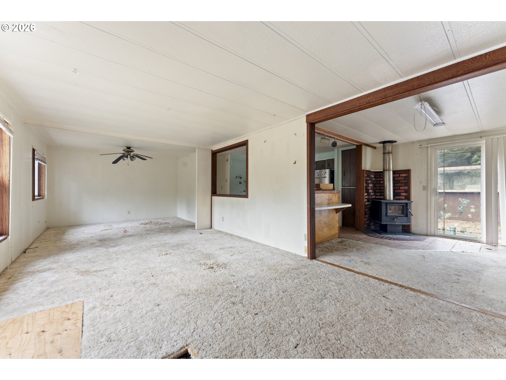 53665 Rosa Road Bandon, OR 97411 - Photo 35 of 47 a view of a big room with closet and windows