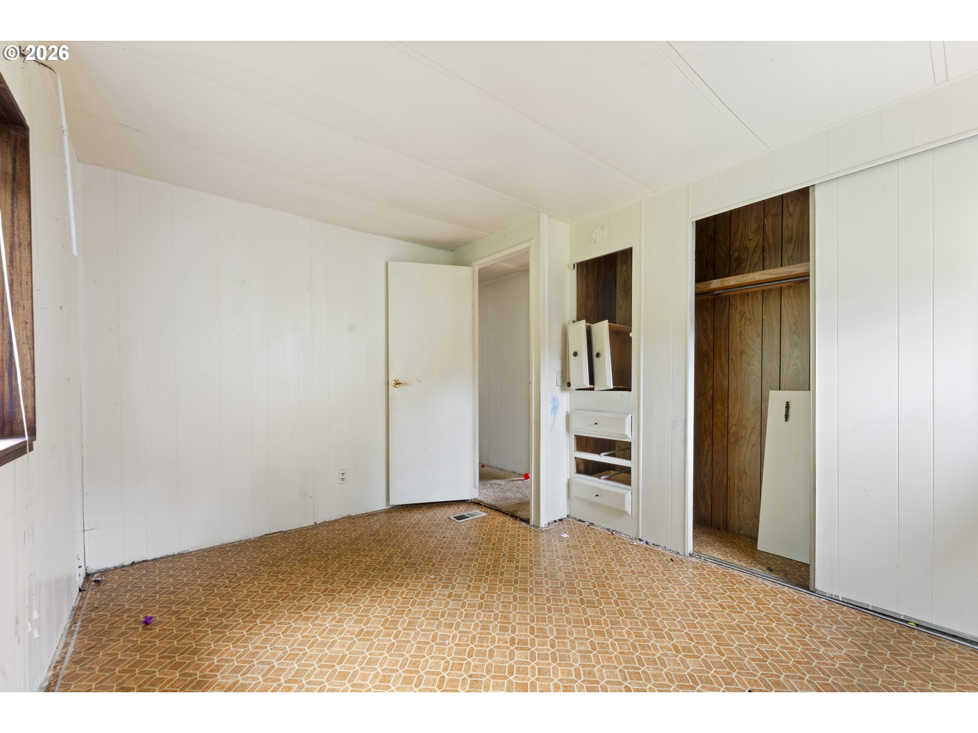 53665 Rosa Road Bandon, OR 97411 - Photo 38 of 47 a view of empty room with closet and cabinet