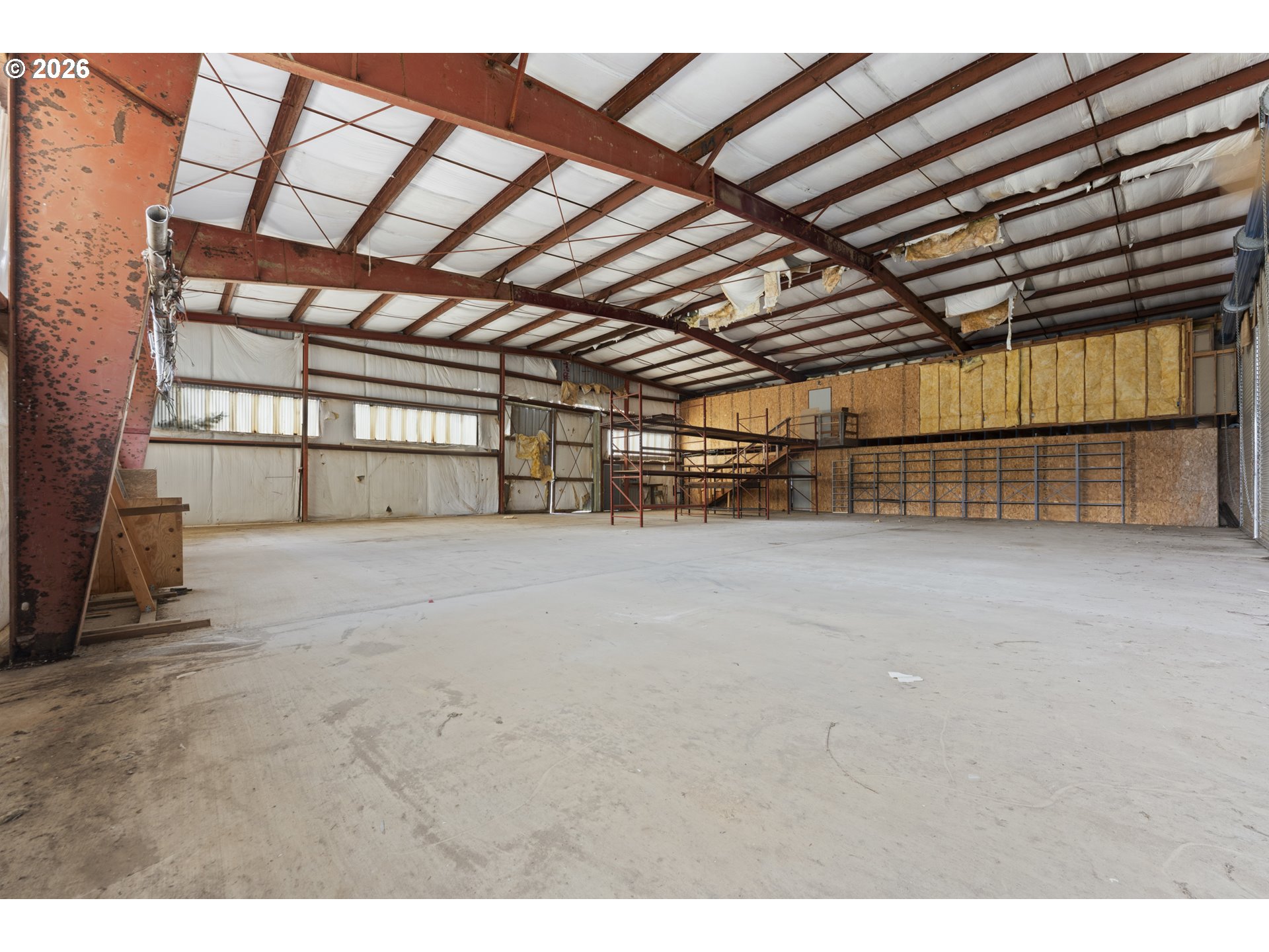53665 Rosa Road Bandon, OR 97411 - Photo 9 of 47 a view of empty room with racks