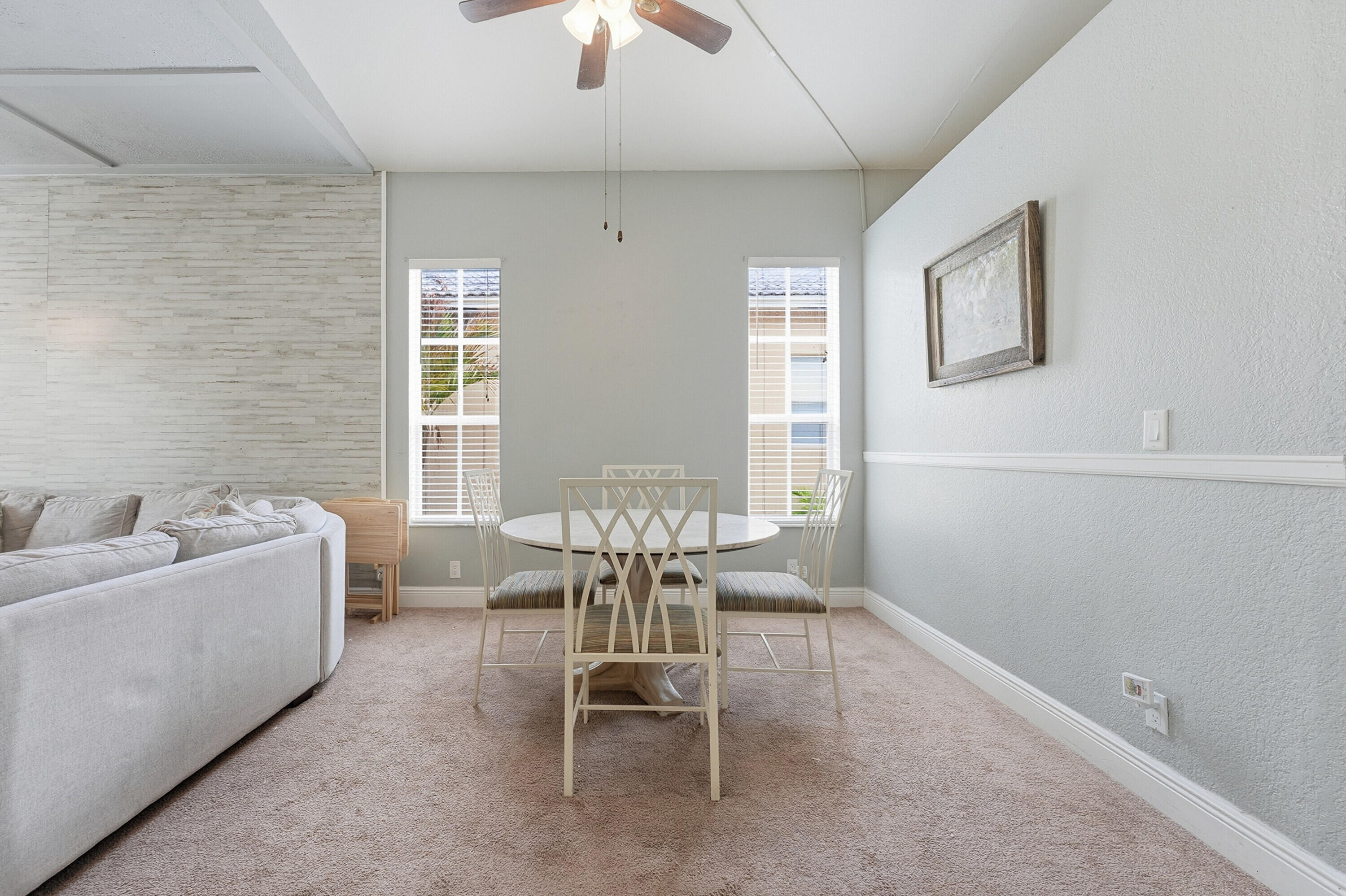 6117 Spring Lake Terrace Fort Pierce, FL 34951 - Photo 18 of 38 a living room with furniture and a window