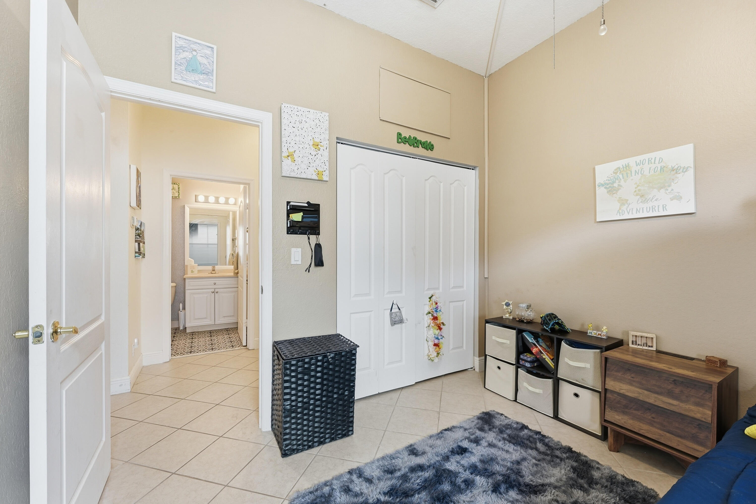 6117 Spring Lake Terrace Fort Pierce, FL 34951 - Photo 27 of 38 a room with furniture and a dresser