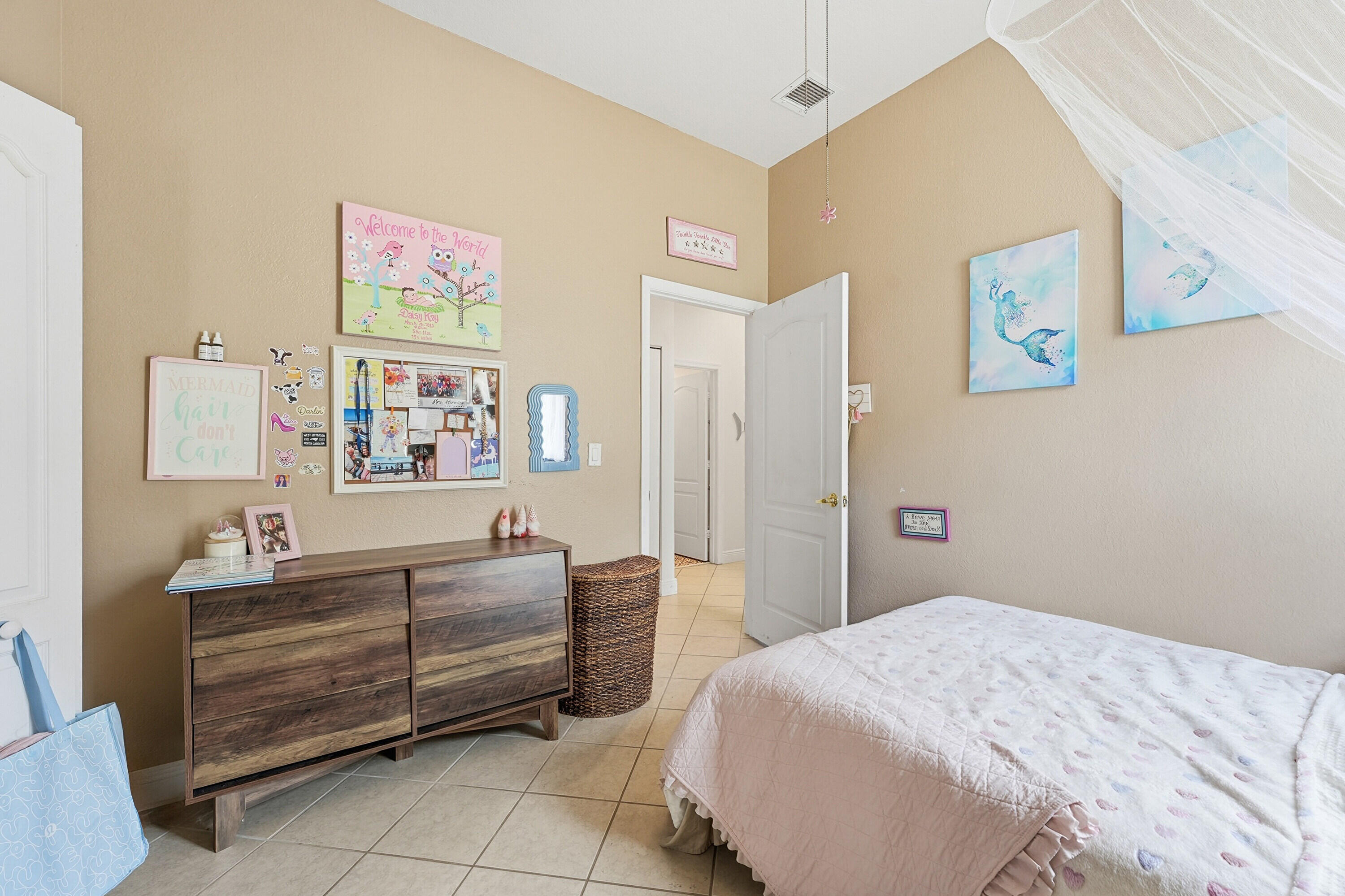 6117 Spring Lake Terrace Fort Pierce, FL 34951 - Photo 29 of 38 a bedroom with a bed and couch