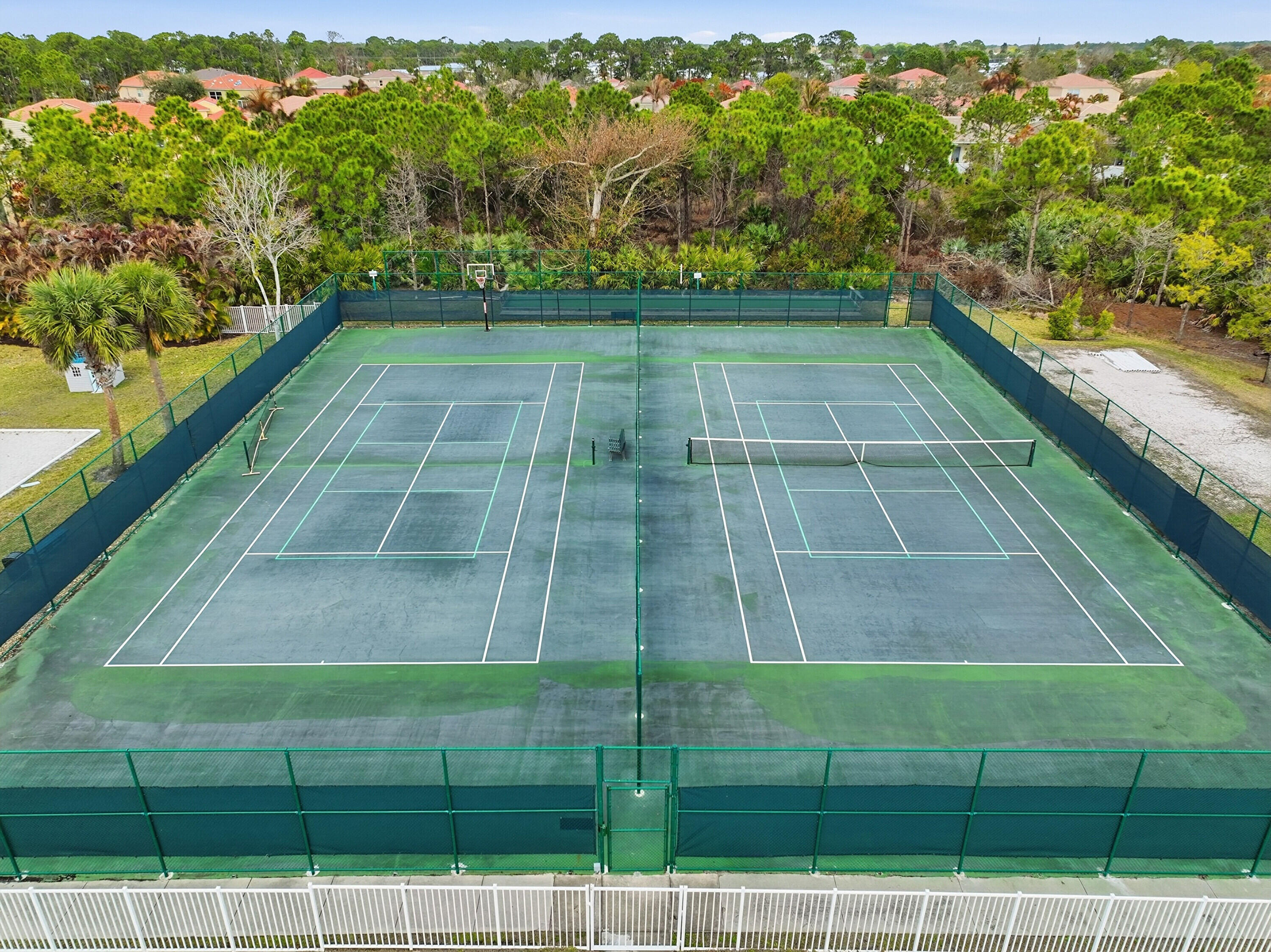 6117 Spring Lake Terrace Fort Pierce, FL 34951 - Photo 35 of 38 a view of a tennis court