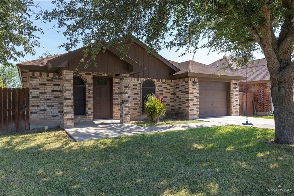 1825 Largo Street Weslaco, TX 78596 - Photo 1 of 1 front view of a house with a yard