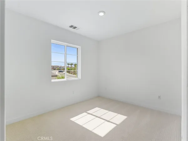an empty room with a window