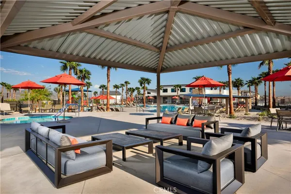 a outdoor space with a patio outdoor seating and city view