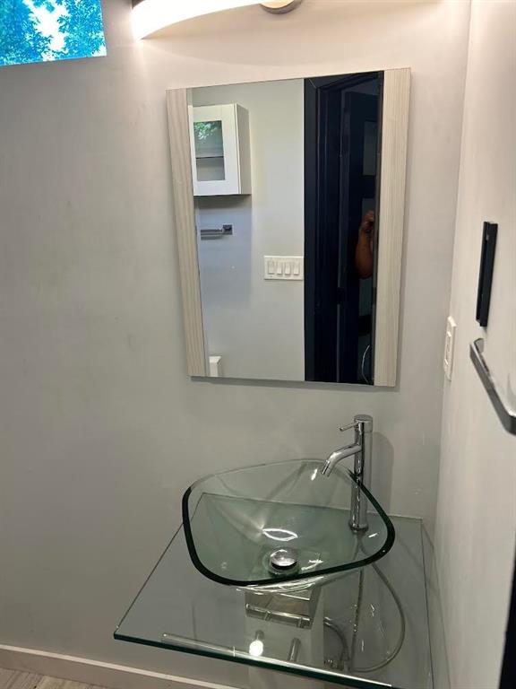 759 Jones Avenue Northwest Atlanta, GA 30314 - Photo 13 of 19 a room with wooden floor and cabinets