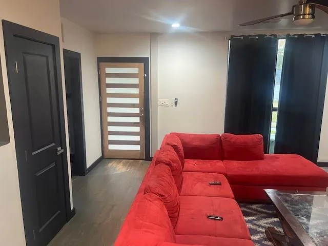 a bedroom with a large bed and a closet