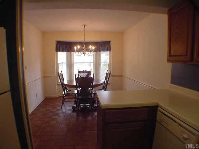 506 Caprice Court Raleigh, NC 27606 - Photo 3 of 10 REVERSE VIEW FROM KITCHEN TO BREAKFAST AREA Other