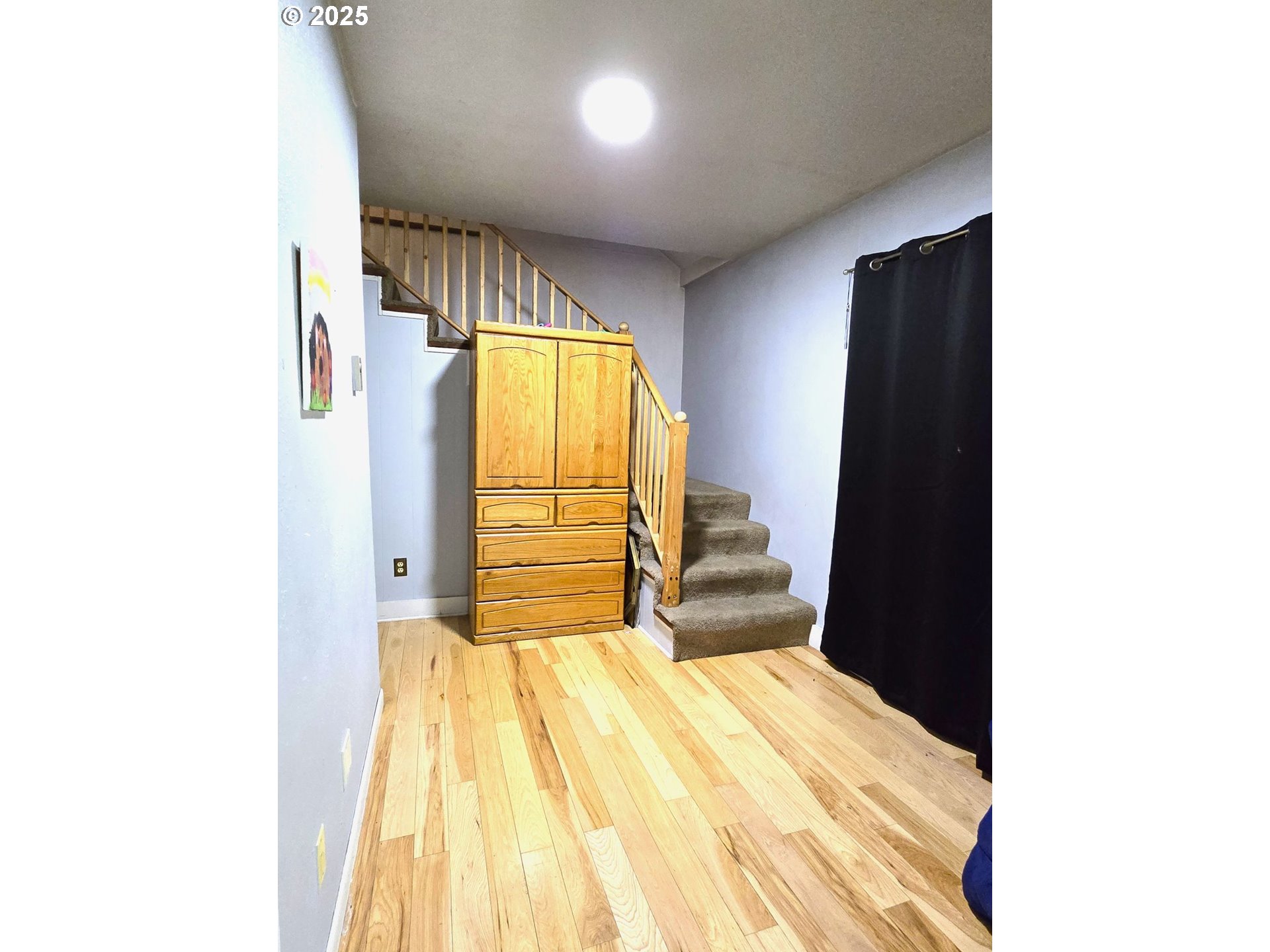 100 Southeast Hillcrest Road John Day, OR 97845 - Photo 13 of 30 a bedroom with a bed and a window