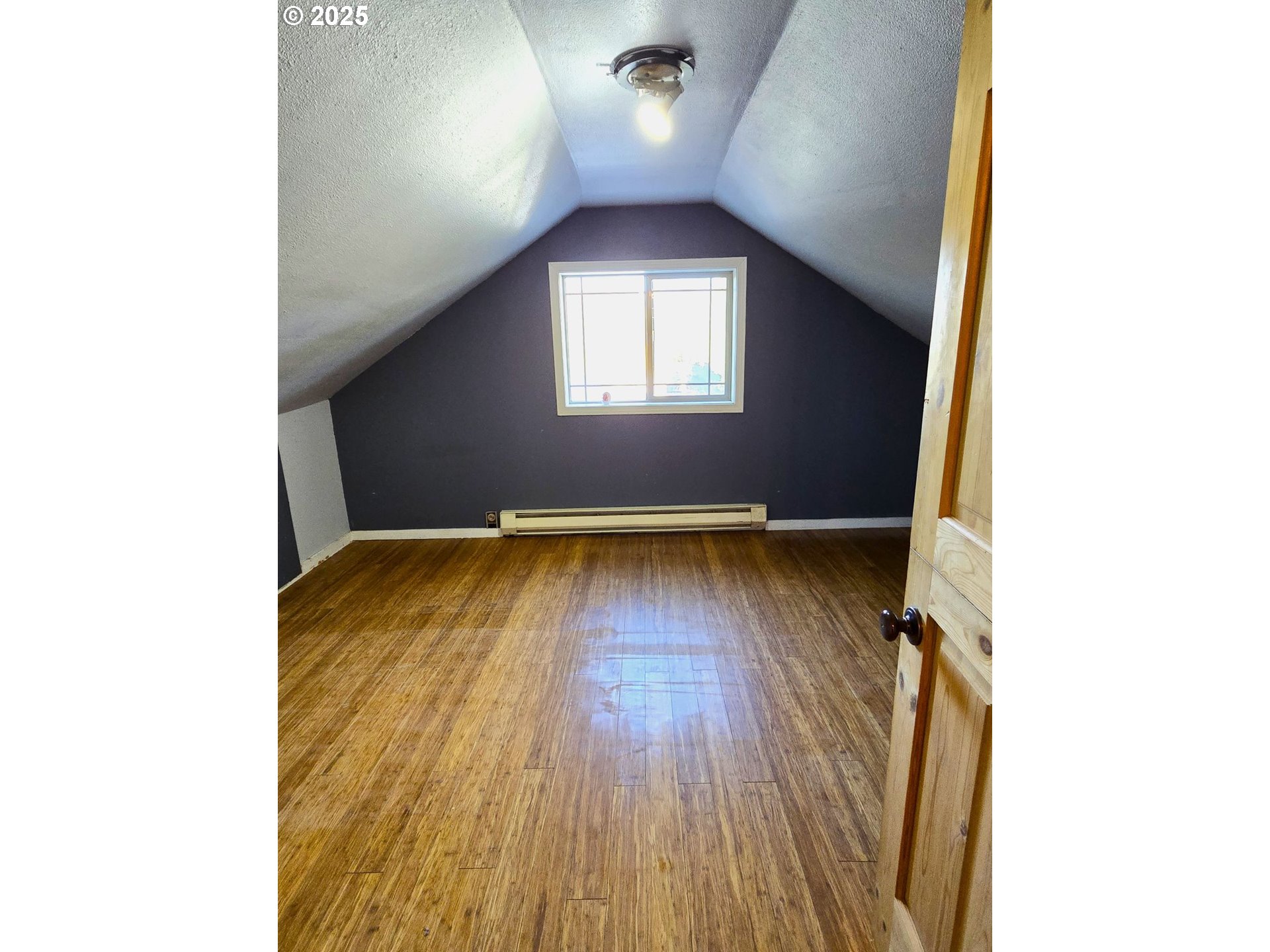 100 Southeast Hillcrest Road John Day, OR 97845 - Photo 17 of 30 a view of a hallway with wooden floor