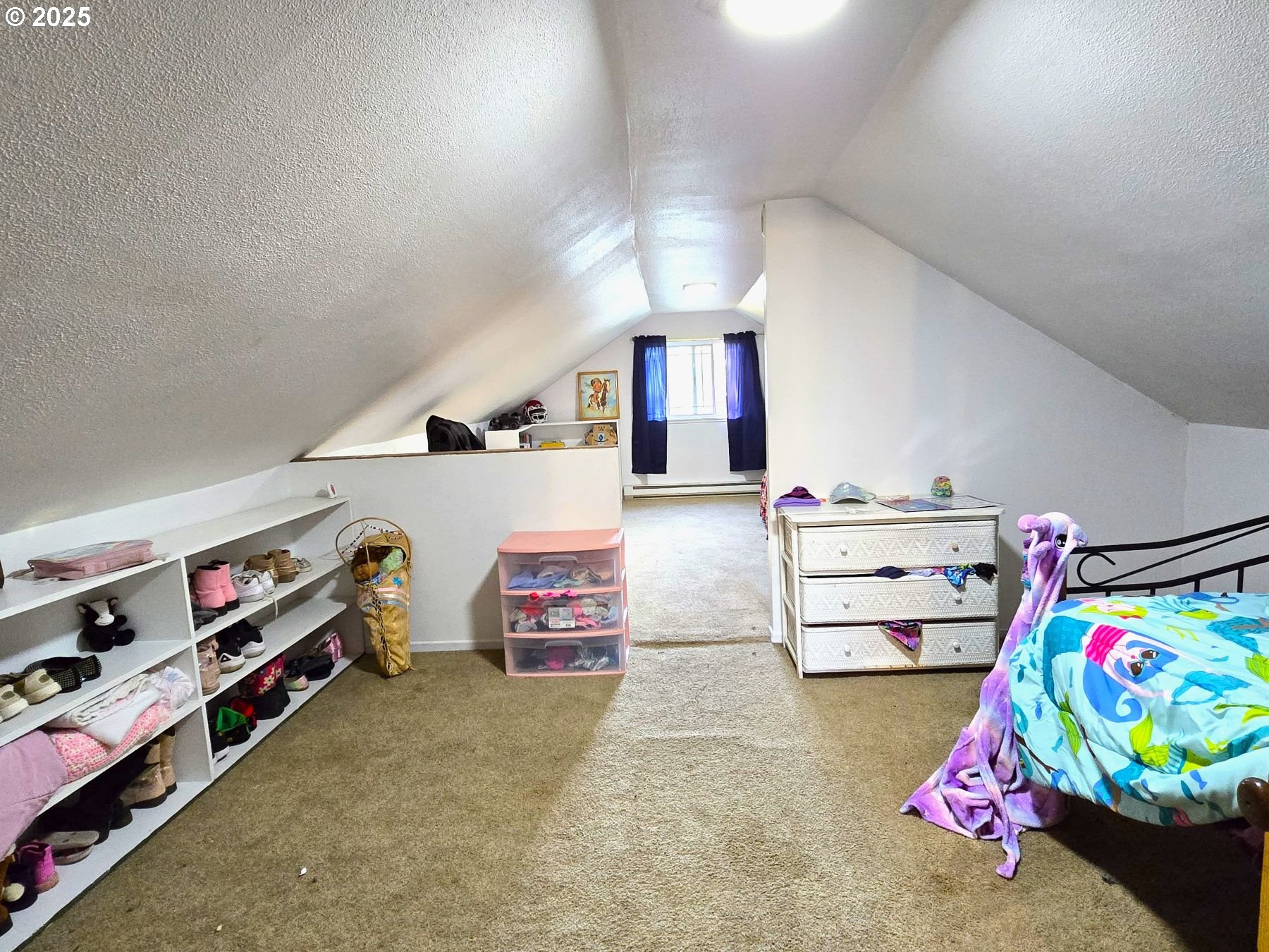 100 Southeast Hillcrest Road John Day, OR 97845 - Photo 19 of 30 a bedroom with lots of baby toys
