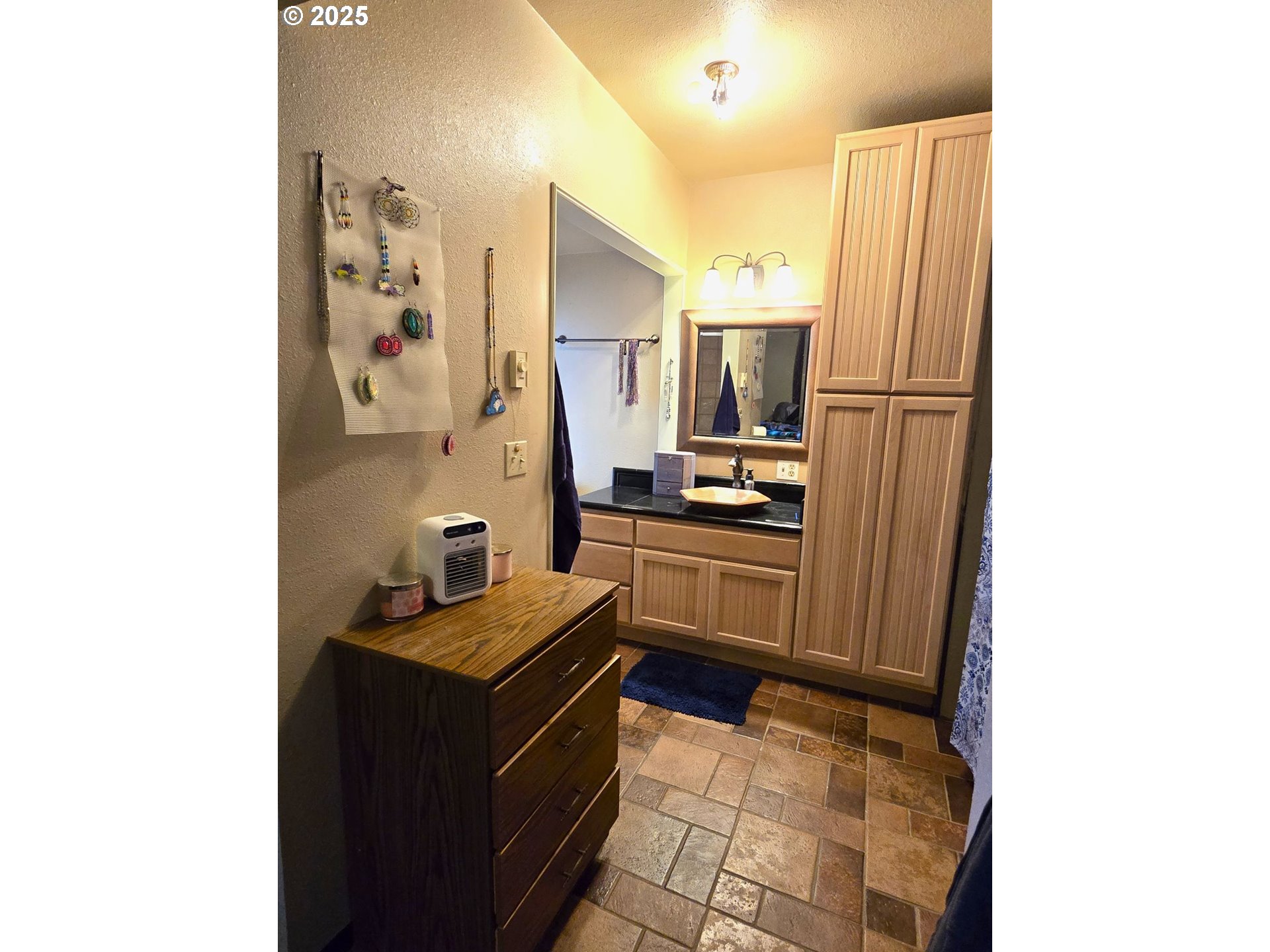 100 Southeast Hillcrest Road John Day, OR 97845 - Photo 26 of 30 a kitchen with granite countertop a refrigerator and a stove